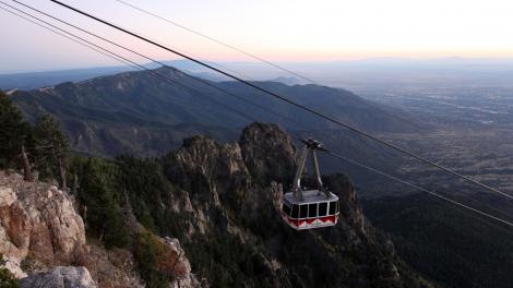 View of the Sandia Tram as it climbs up the steep mountainside