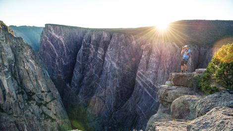 Hiker taking in the depths of the canyon