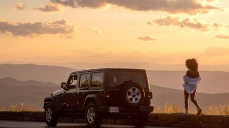 Pausing to watch the sunrise while driving along Skyline Drive in Shenandoah National Park, Virginia
