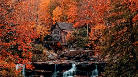 Fall colors surrounding a historic mill at Babcock State Park in West Virginia