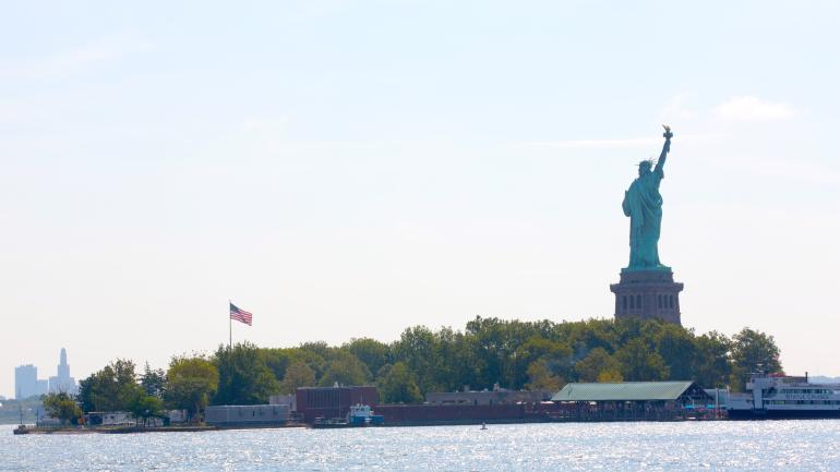 View of the Statue of Liberty from the Liberty State Park boardwalk in Jersey City, Hudson County.