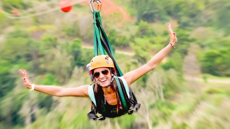 Soaring like a superhero over the treetops on one of the park’s zip lines