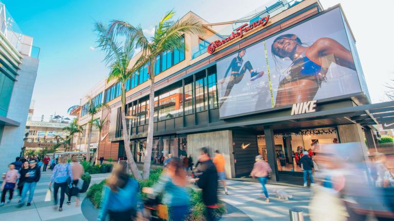 Shoppers exploring the open-air walkways of Santa Monica Place