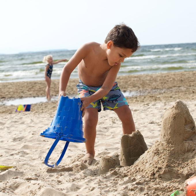Playing in the sand at Plattsburgh City Beach in Plattsburgh, New York