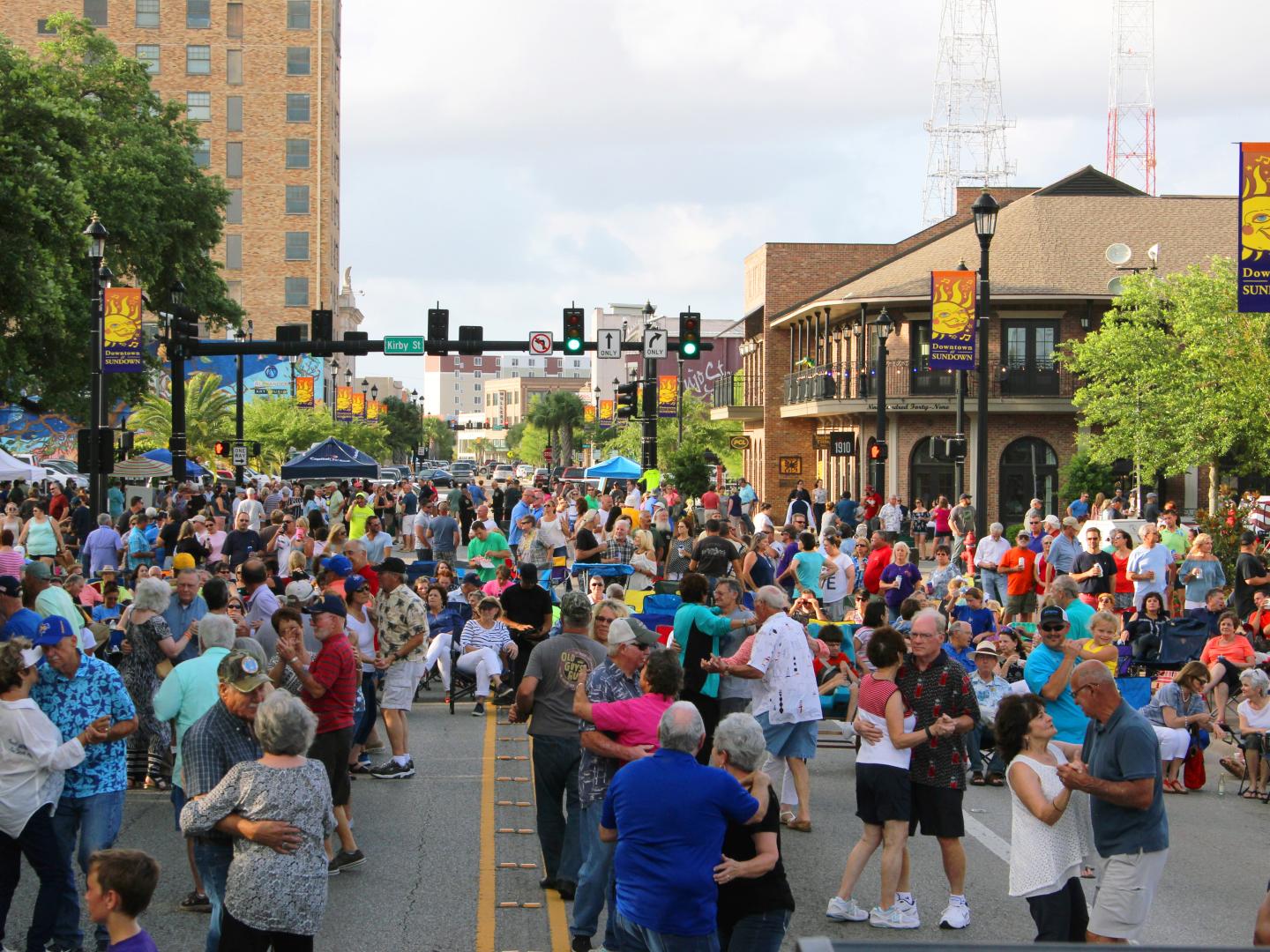 Dancing in the streets during the Downtown at Sundown festivities in Lake Charles, Louisiana