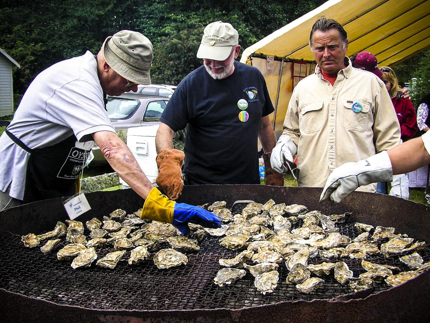 Cooking chargrilled oysters during the Jazz & Oysters event in Ocean Park