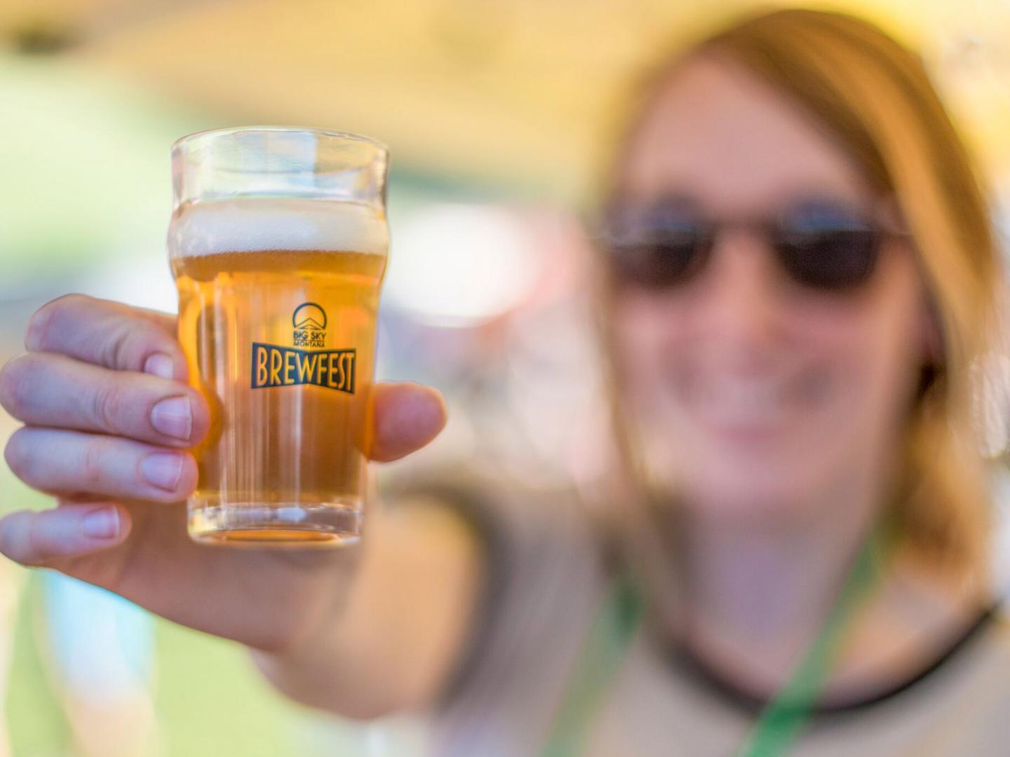 Sampling a craft beer during the Big Sky Brew Fest in Montana
