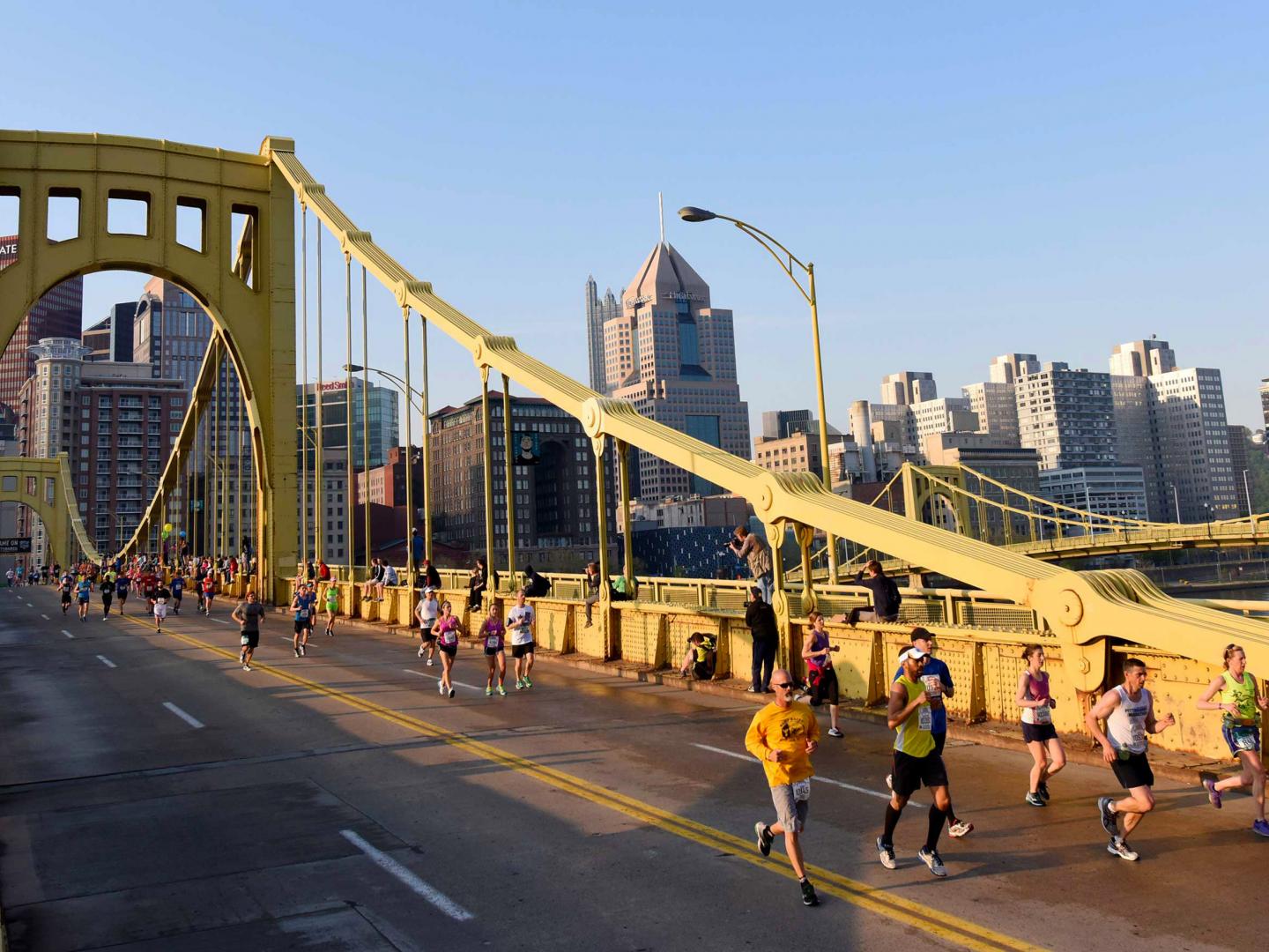 Runners crossing the Clemente Bridge during the Pittsburgh Marathon 