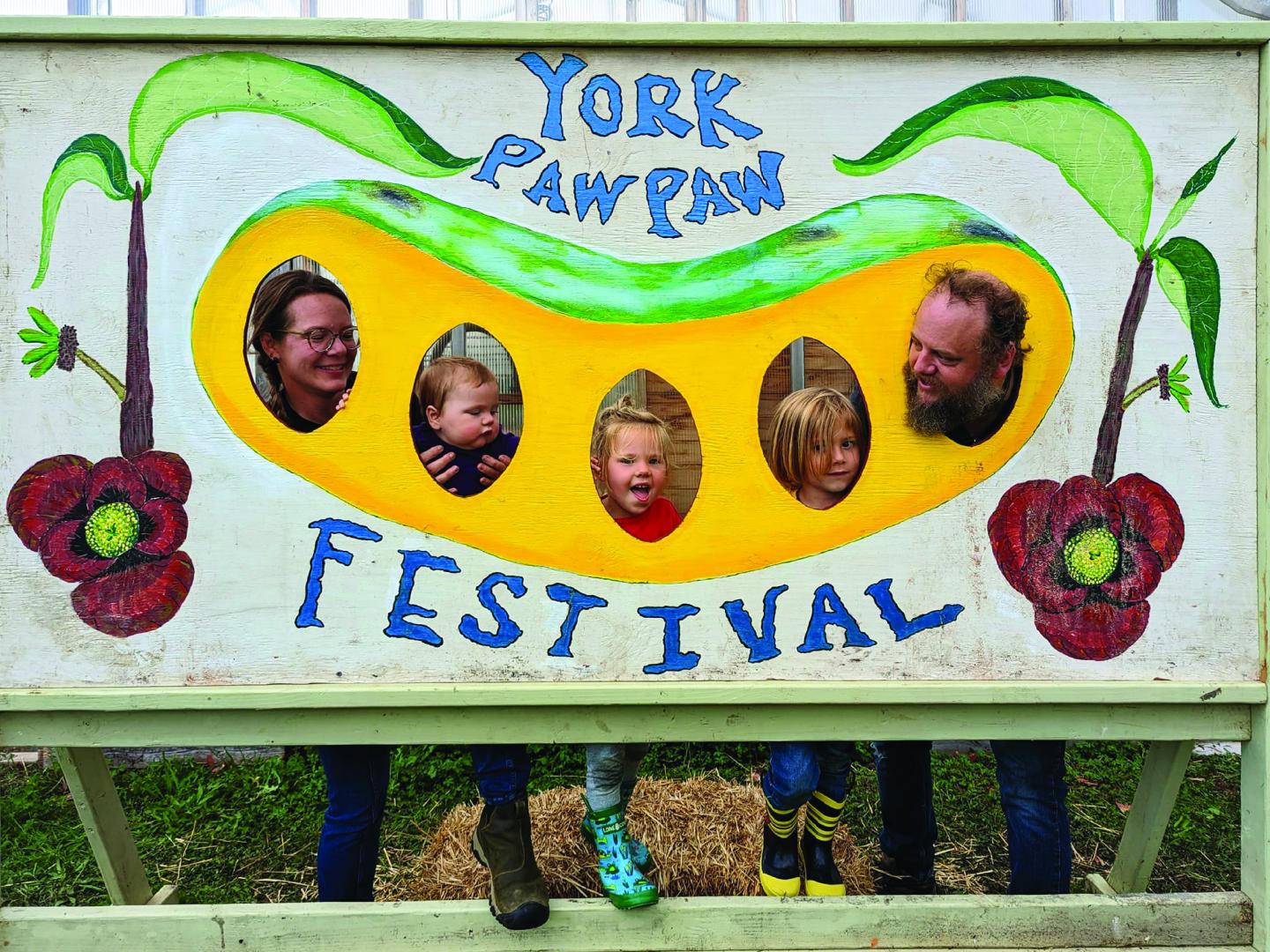 Posing with themed décor at the annual York County Paw Paw Festival in York, Pennsylvania