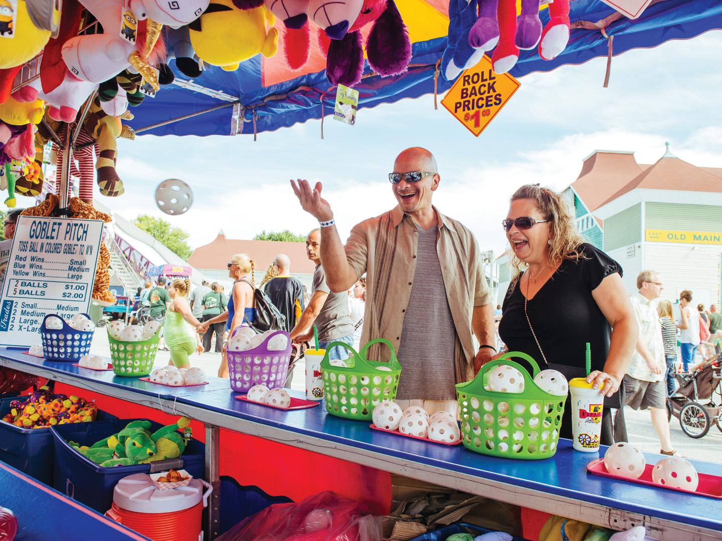 Enjoying carnival games at the York State Fair in York, Pennsylvania