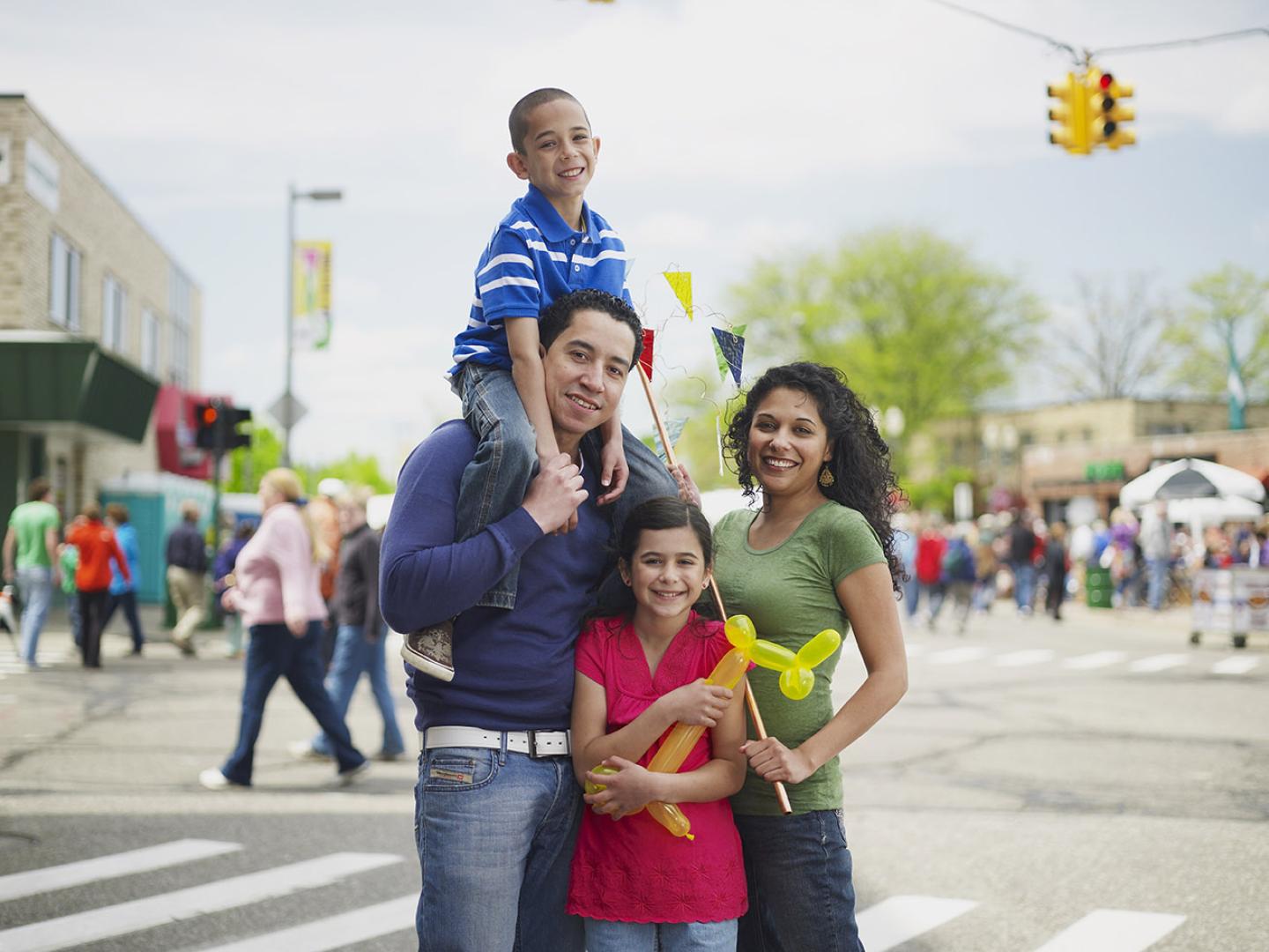 Family enjoying the East Lansing Art Festival