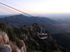 View of the Sandia Tram as it climbs up the steep mountainside