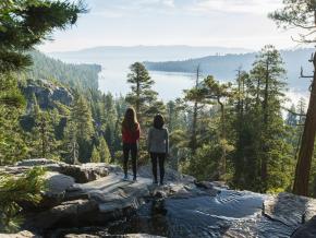 Women overlooking Lake Tahoe from Emerald Bay State Park in California