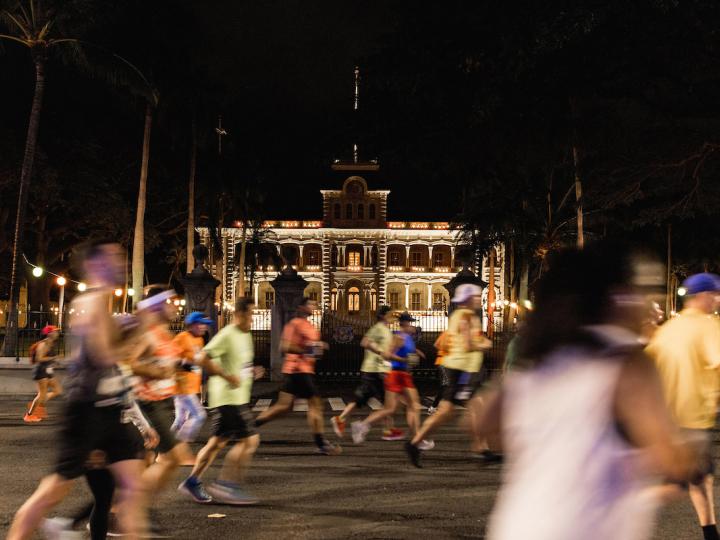 Runners compete in the Honolulu Marathon in Honolulu, Hawai'i