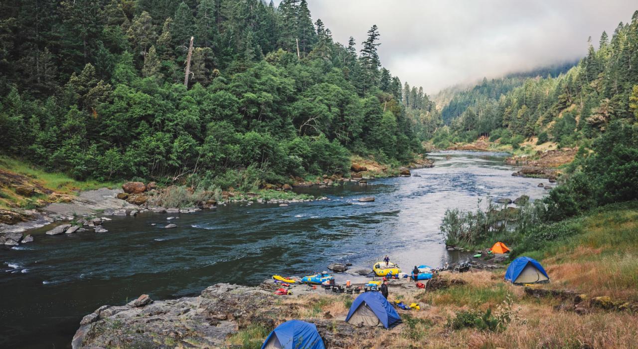 Camping alongside the Wild and Scenic Rogue River on an Oregon whitewater rafting trip