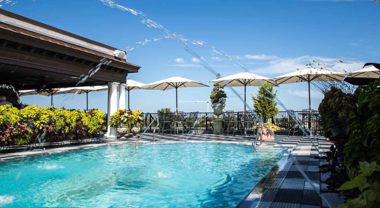 Relax by the swimming pool at the Market Pavilion Hotel in Charleston, South Carolina