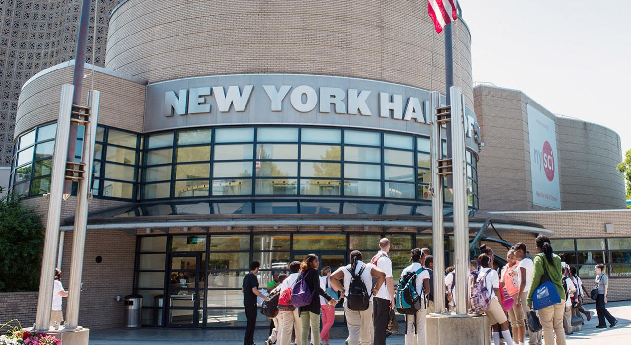 Children gathering in front of the New York Hall of Science in Queens 