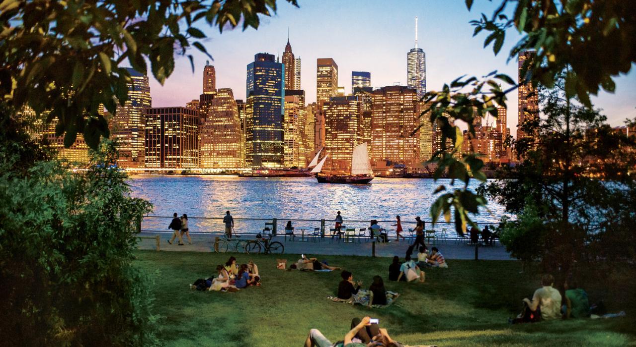 Brooklyn Bridge Park along the East River with views of the New York City skyline