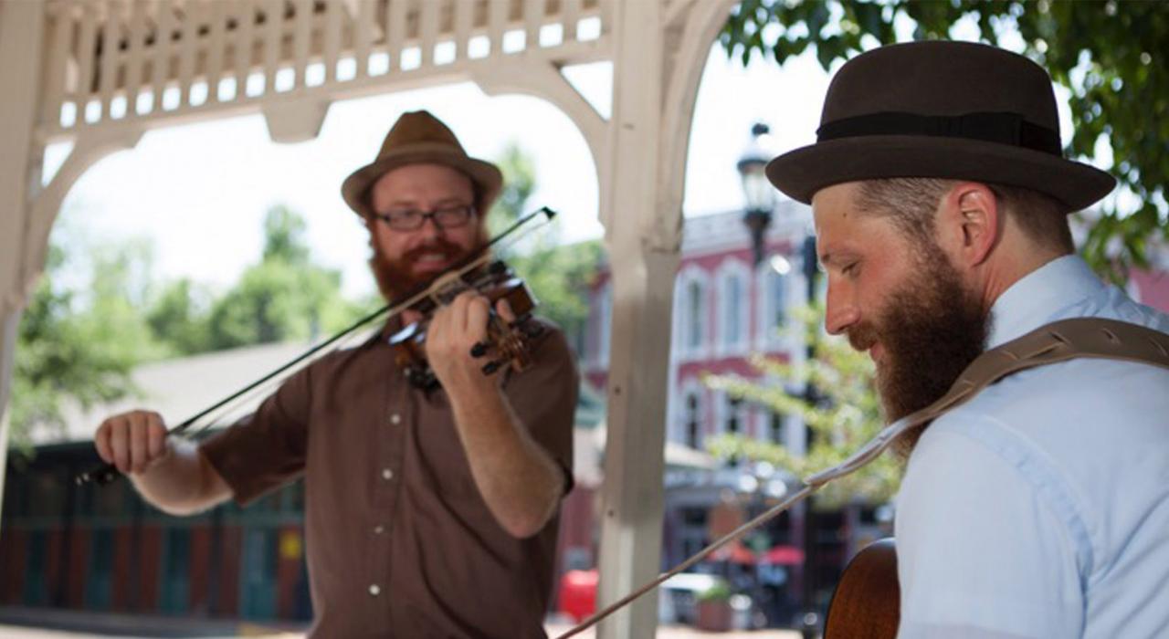 Musicians perform in a downtown gazebo