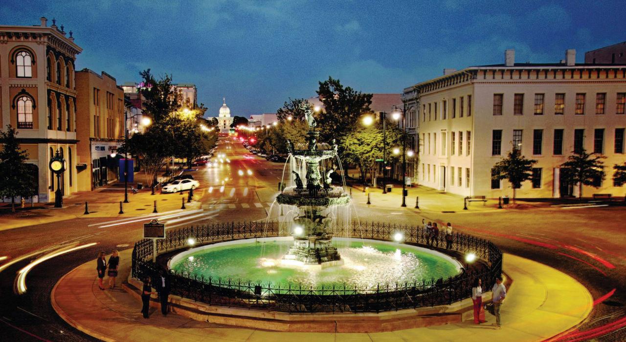 Nighttime view of the Court Square Fountain, built in 1885