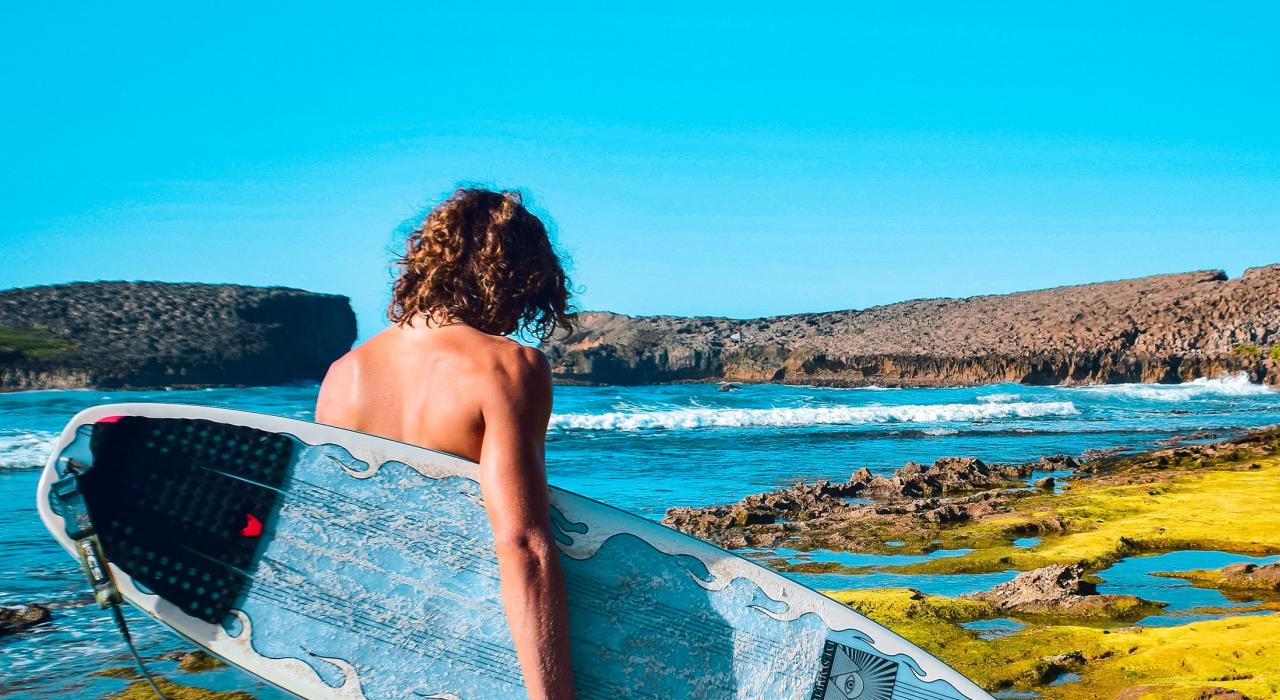 Surfing near Cueva del Indio in Las Piedras