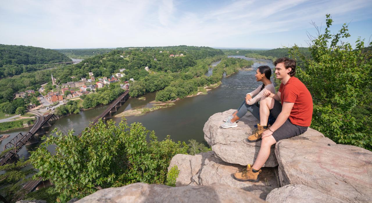 Hikers at Maryland Heights Trail overlook above Harpers Ferry, West Virginia 