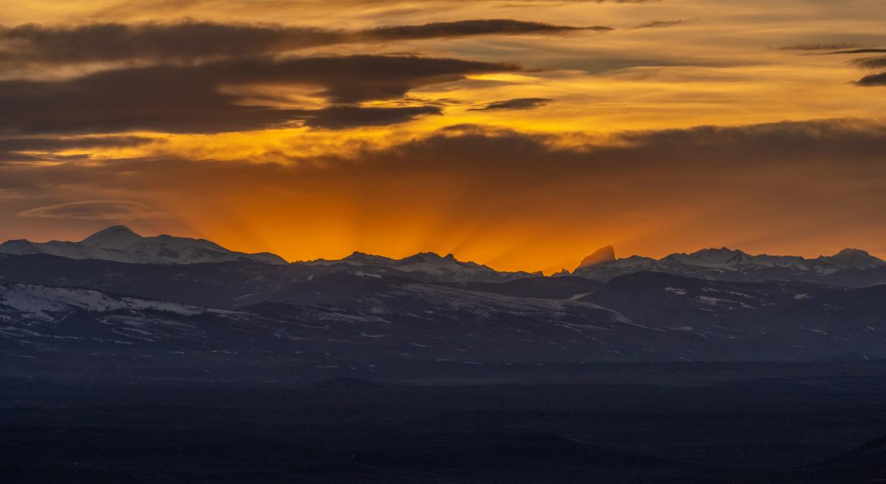 The sun rises over the Wind River Mountains near Riverton